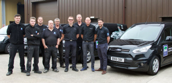 A photo of the R&J Machinery team